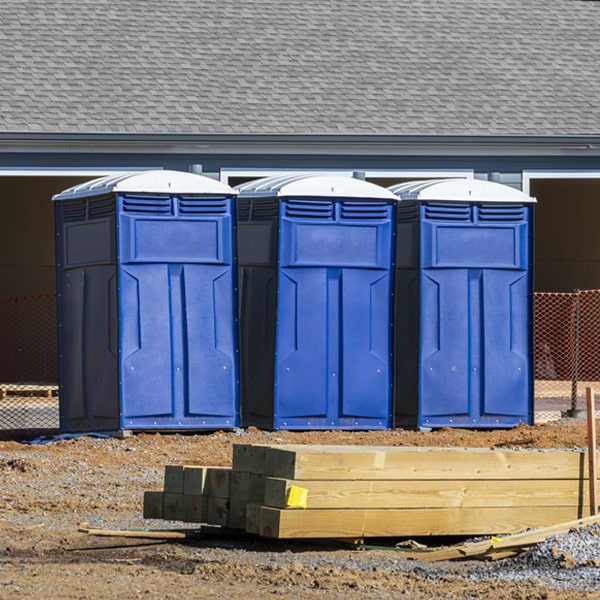 how often are the portable restrooms cleaned and serviced during a rental period in Portland